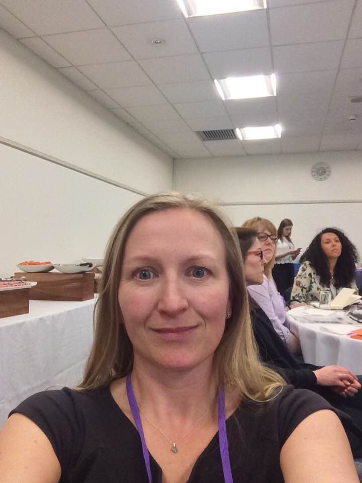 Selfie of Melanie at a networking event