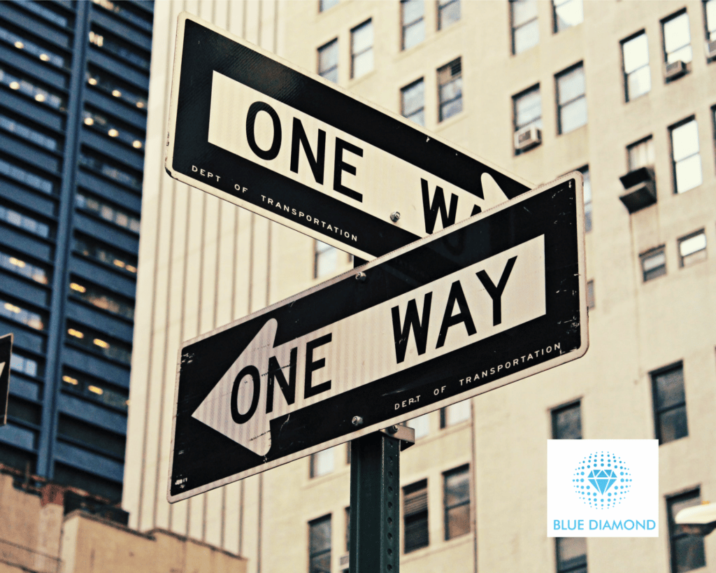 Two 'one way' signs pointing in opposite directions - looking for next role