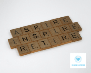 aspire, inspire and retire in block letters with blue diamond logo