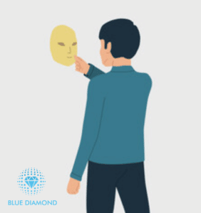 man looking at a mask