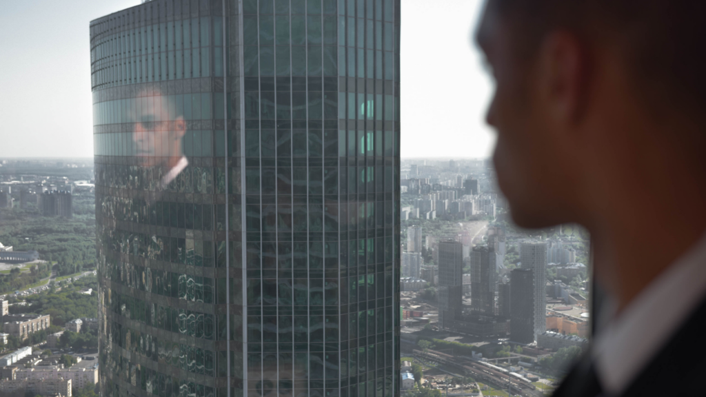 How to Progress in Your Finance Career: From Technical Expert to Leader Senior finance leader reviewing high-level enterprise strategy in a corner office.